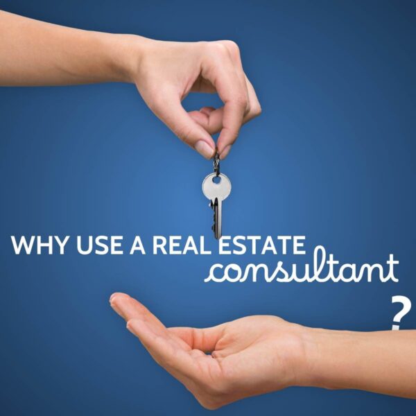 Hand passing a single house key on a chain to an open palm against a blue background, captioned why use a real estate consultant